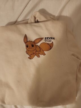 Pokemon Cream Pullover Sweatshirt with Eevee Graphic